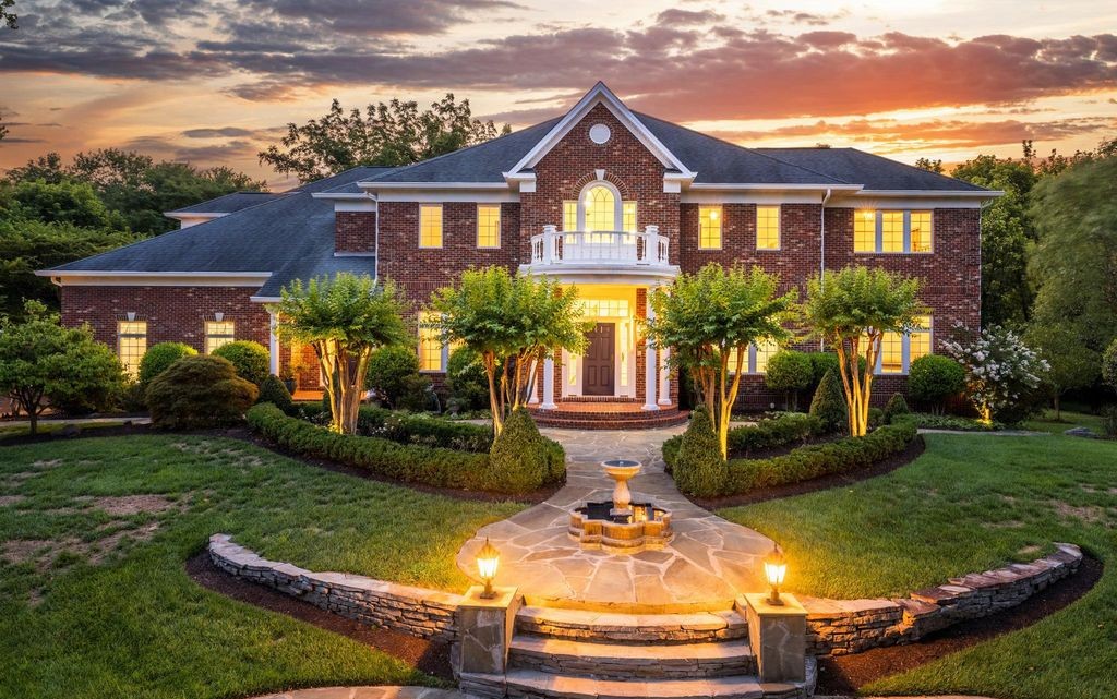 Brick estate at dusk on Georgetown Pike, McLean, Virginia